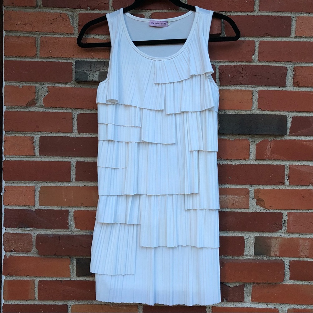 The Impeccable Pig • white ruffled mini dress